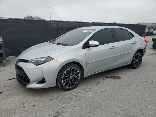 TOYOTA COROLLA L 2017 with VIN 5YFBURHE1HP675262 - Photo from auction