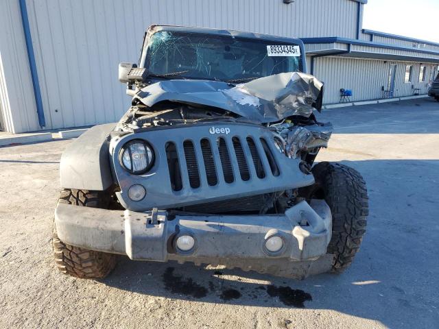 Photo 5 from auction – 2015 JEEP WRANGLER S with VIN 1C4AJWAG0FL636571