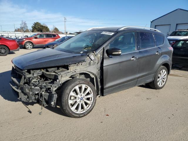 FORD ESCAPE TIT 2017 with VIN 1FMCU0J96HUA63022 - Photo from auction