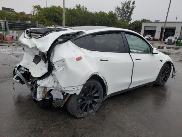 Photo 3 from auction – 2022 TESLA MODEL Y with VIN 7SAYGAEEXNF433975