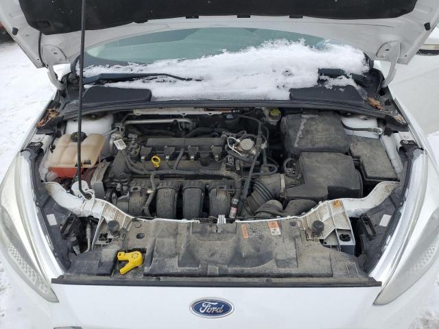 Photo 11 from auction – 2016 FORD FOCUS SE with VIN 1FADP3F28GL323024