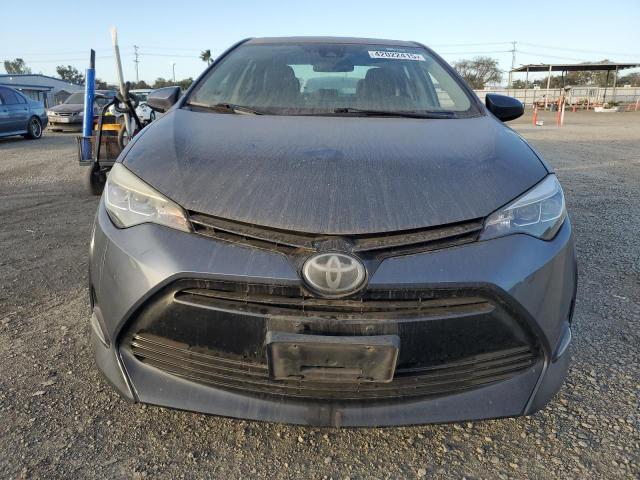 Photo 5 from auction – 2018 TOYOTA COROLLA L with VIN 5YFBURHE6JP822746