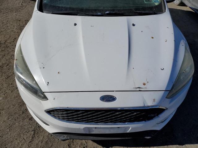 Photo 11 from auction – 2015 FORD FOCUS SE with VIN 1FADP3K25FL290035