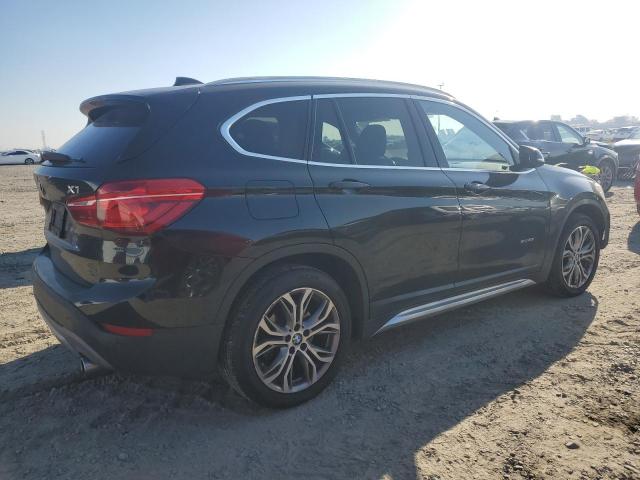 Photo 3 from auction – 2017 BMW X1 XDRIVE2 with VIN WBXHT3Z38H4A56710