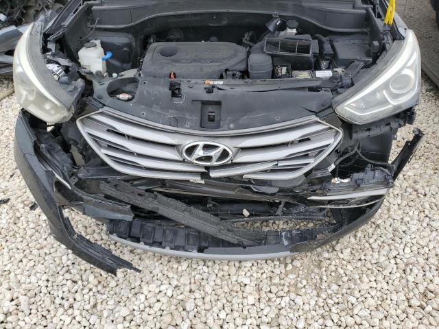 Photo 12 from auction – 2017 HYUNDAI SANTA FE S with VIN 5NMZU3LB4HH005482