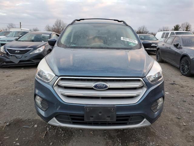 Photo 5 from auction – 2018 FORD ESCAPE SE with VIN 1FMCU9GD7JUC16321