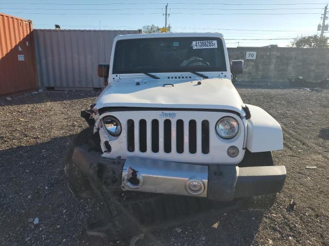 Photo 5 from auction – 2015 JEEP WRANGLER S with VIN 1C4AJWBG1FL649148