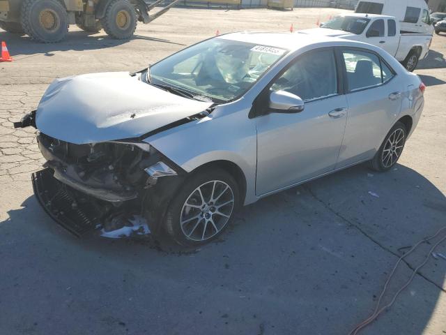 TOYOTA COROLLA L 2017 with VIN 5YFBURHE7HP595299 - Photo from auction