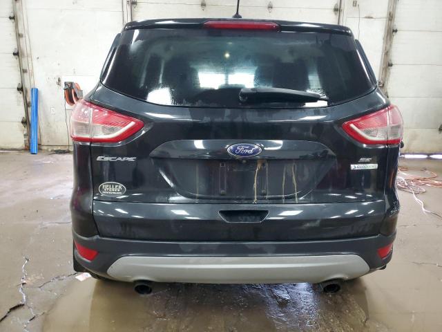 Foto 6 de la subasta – 2014 FORD ESCAPE SE con VIN 1FMCU0GX4EUE09683
