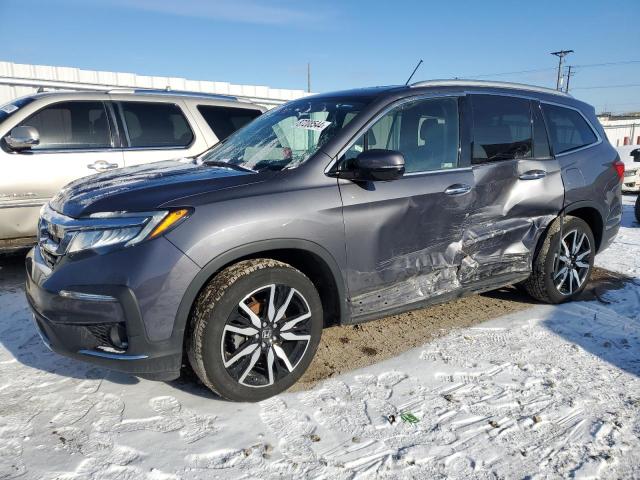 HONDA PILOT ELIT 2022 with VIN 5FNYF6H04NB044391 - Photo from auction