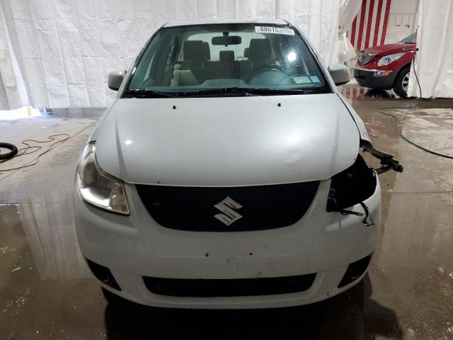 Photo 5 from auction – 2012 SUZUKI SX4 LE with VIN JS2YC5A39C6303530