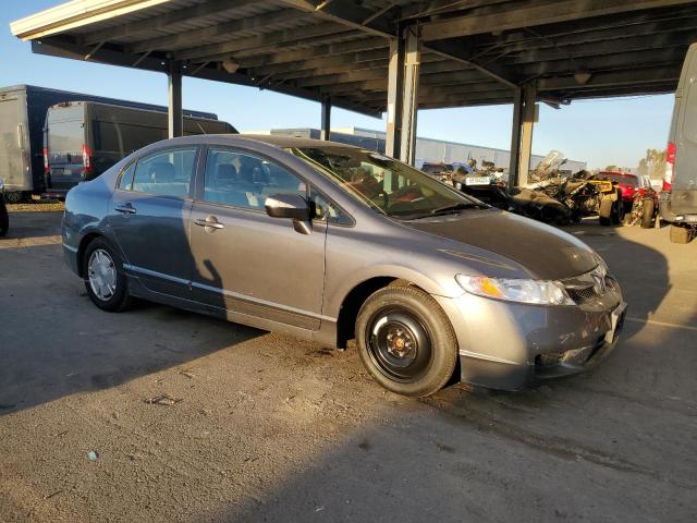 Photo 4 from auction – 2010 HONDA CIVIC HYBR with VIN JHMFA3F20AS006676