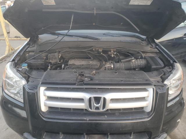 Photo 12 from auction – 2006 HONDA PILOT EX with VIN 2HKYF18546H503257