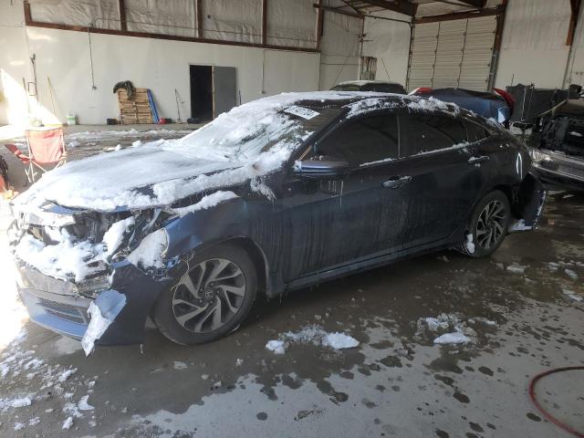 HONDA CIVIC EX 2018 with VIN 19XFC2F71JE031378 - Photo from auction