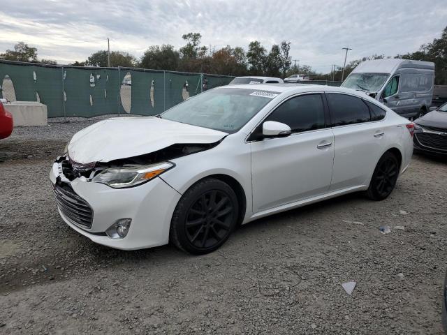 TOYOTA AVALON BAS 2014 with VIN 4T1BK1EB4EU128059 - Photo from auction