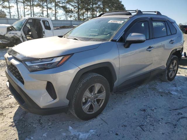 TOYOTA RAV4 XLE 2022 with VIN 2T3W1RFV4NC210216 - Photo from auction