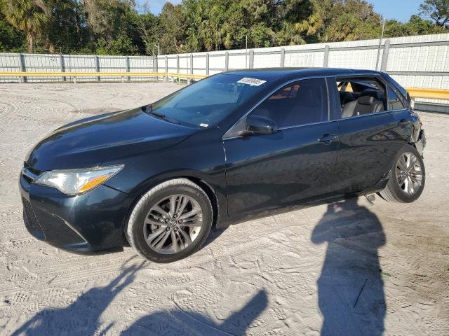 TOYOTA CAMRY LE 2017 with VIN 4T1BF1FK2HU774496 - Photo from auction