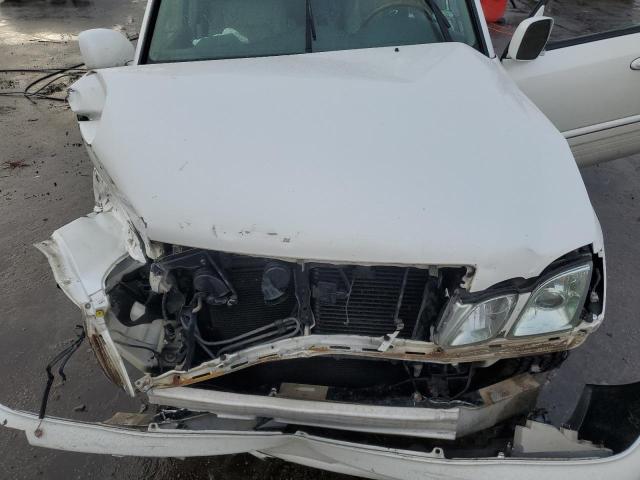 Photo 12 from auction – 2004 LEXUS LX 470 with VIN JTJHT00WX43539242