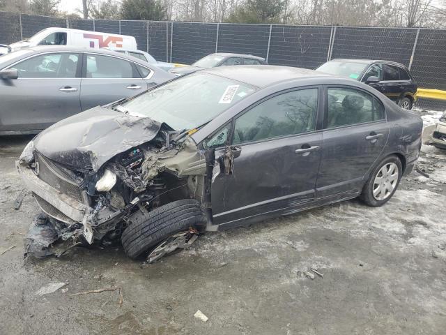 HONDA CIVIC LX 2011 with VIN 2HGFA1F54BH309101 - Photo from auction