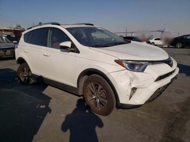 Photo 4 from auction – 2017 TOYOTA RAV4 XLE with VIN JTMRFREV0HJ708947