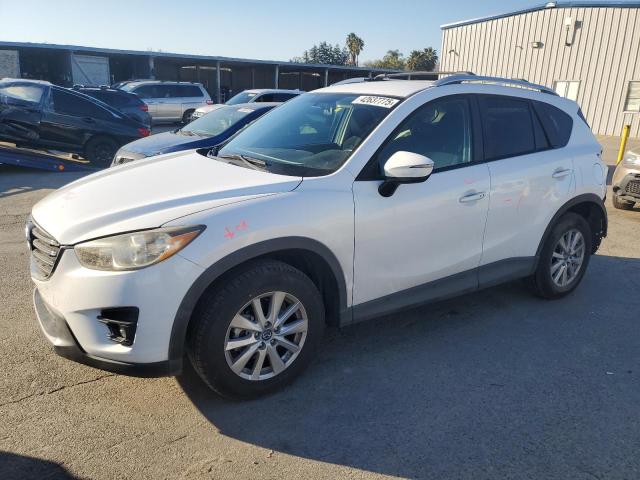 MAZDA CX-5 TOURI 2016 with VIN JM3KE2CY4G0736352 - Photo from auction