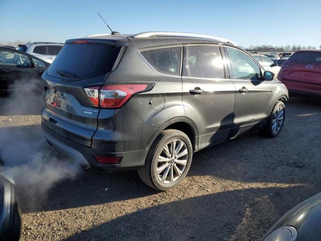 Photo 3 from auction – 2017 FORD ESCAPE TIT with VIN 1FMCU0JD8HUD73323