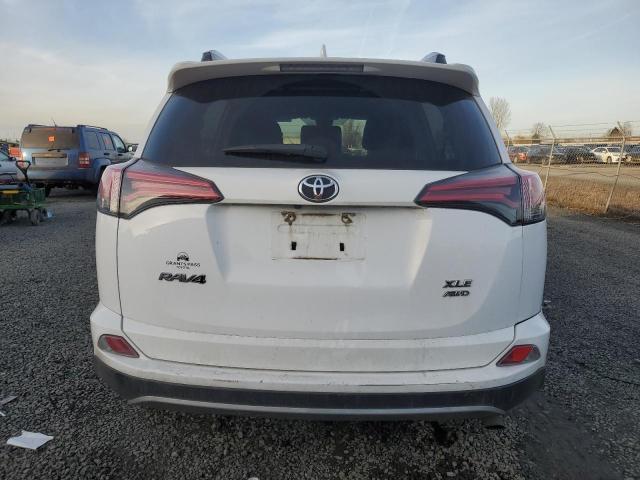 Photo 6 from auction – 2017 TOYOTA RAV4 XLE with VIN 2T3RFREV4HW566720