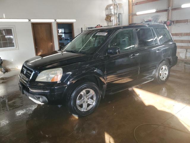 HONDA PILOT EXL 2003 with VIN 2HKYF18633H594395 - Photo from auction