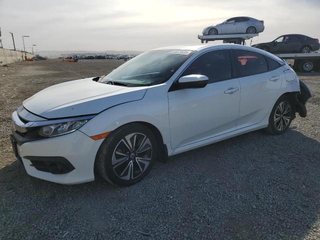 HONDA CIVIC EX 2017 with VIN 2HGFC1F39HH660006 - Photo from auction