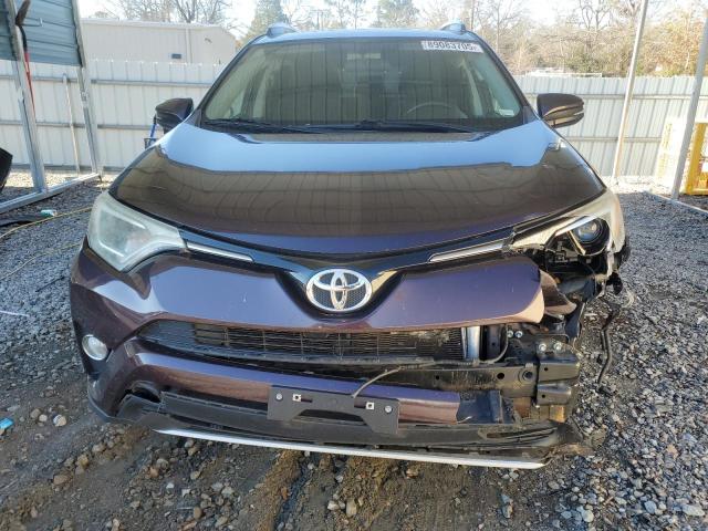 Photo 5 from auction – 2016 TOYOTA RAV4 XLE with VIN 2T3RFREV7GW517803