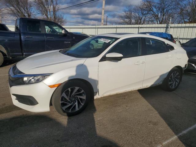 HONDA CIVIC EX 2017 with VIN 2HGFC2F73HH519859 - Photo from auction