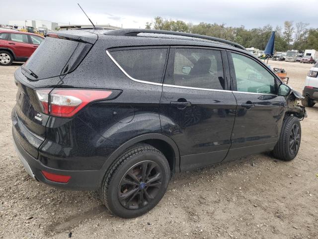 Photo 3 from auction – 2018 FORD ESCAPE SE with VIN 1FMCU0GD3JUB15546