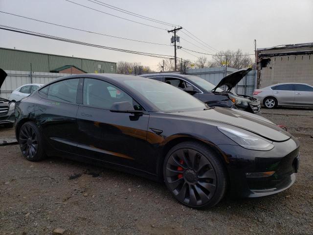 Photo 4 from auction – 2022 TESLA MODEL 3 with VIN 5YJ3E1EC0NF109722