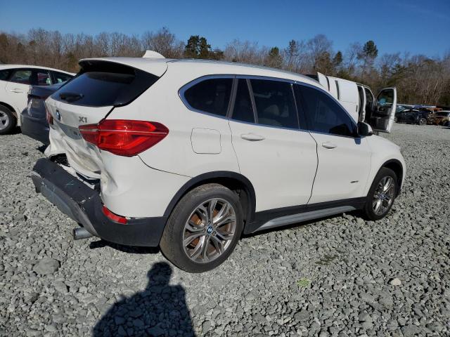 Photo 3 from auction – 2017 BMW X1 XDRIVE2 with VIN WBXHT3Z33H4A65718