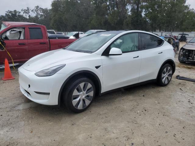 TESLA MODEL Y 2024 with VIN 7SAYGDED1RF095042 - Photo from auction