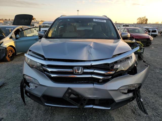 Photo 5 from auction – 2016 HONDA PILOT TOUR with VIN 5FNYF6H99GB079784
