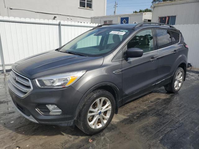 FORD ESCAPE SE 2018 with VIN 1FMCU9GD6JUD06012 - Photo from auction
