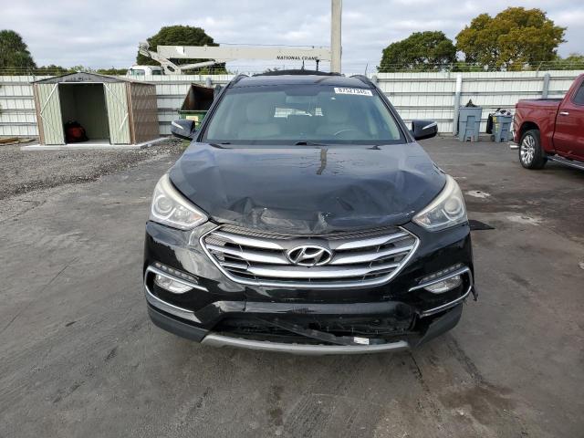 Photo 5 from auction – 2018 HYUNDAI SANTA FE S with VIN 5NMZU3LBXJH098837