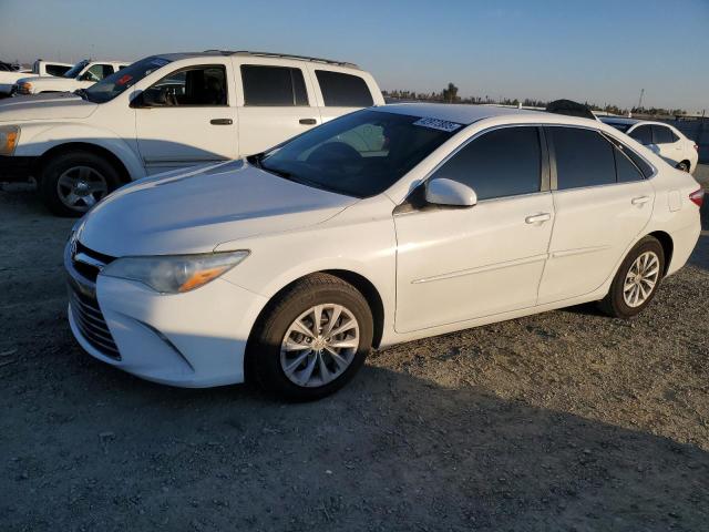 TOYOTA CAMRY LE 2016 with VIN 4T4BF1FK5GR565435 - Photo from auction
