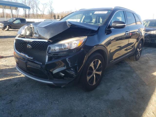 KIA SORENTO EX 2016 with VIN 5XYPHDA5XGG123415 - Photo from auction