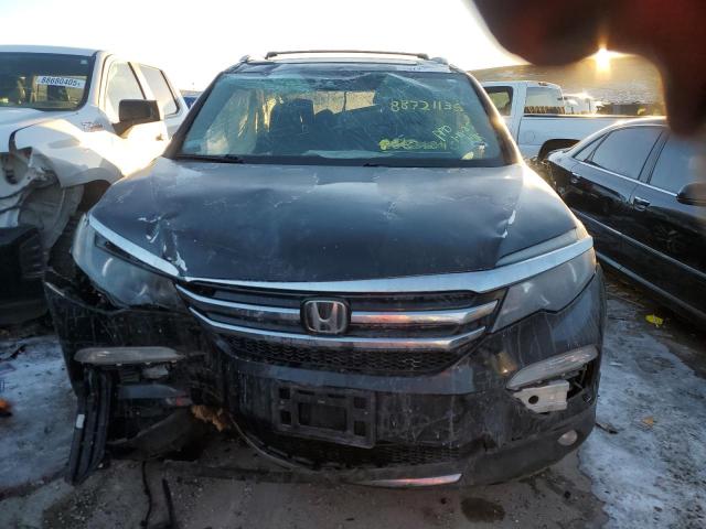 Photo 5 from auction – 2016 HONDA PILOT ELIT with VIN 5FNYF6H03GB070029