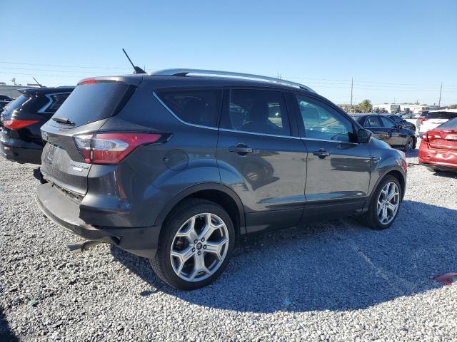 Photo 3 from auction – 2018 FORD ESCAPE TIT with VIN 1FMCU0J92JUA49110