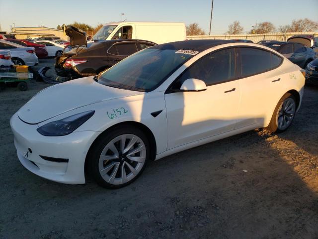 TESLA MODEL 3 2022 with VIN 5YJ3E1EB2NF128179 - Photo from auction