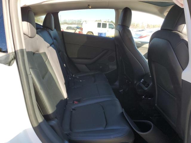 Photo 10 from auction – 2021 TESLA MODEL Y with VIN 5YJYGAEE3MF262062