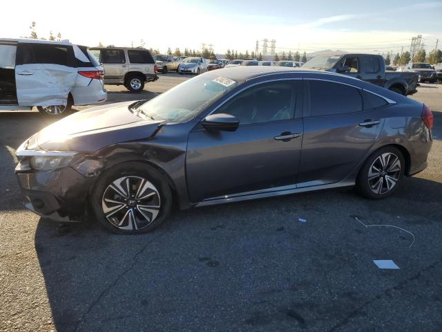 HONDA CIVIC EX 2016 with VIN 2HGFC1F35GH645162 - Photo from auction