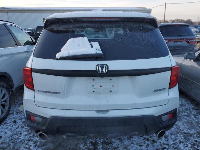 Photo 6 from auction – 2022 HONDA PASSPORT E with VIN 5FNYF8H5XNB006476