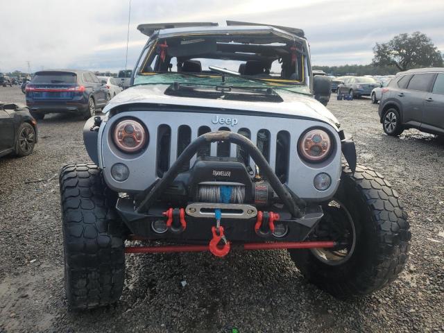 Zdjęcie 5 z aukcji – 2011 JEEP WRANGLER U z VIN 1J4BA3H17BL554443