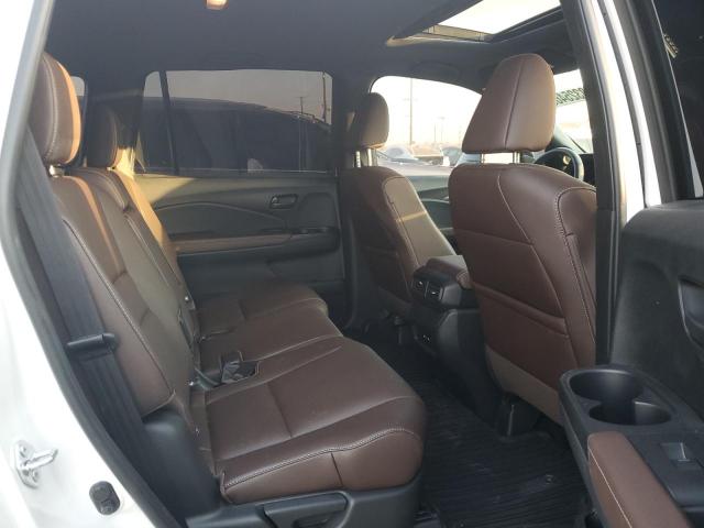Photo 11 from auction – 2024 HONDA PASSPORT E with VIN 5FNYF8H50RB003754