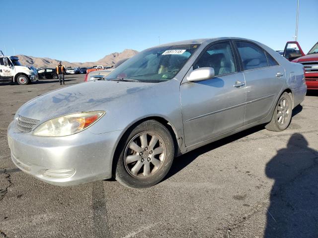 TOYOTA CAMRY LE/X 2002 with VIN JTDBF30K120033974 - Photo from auction