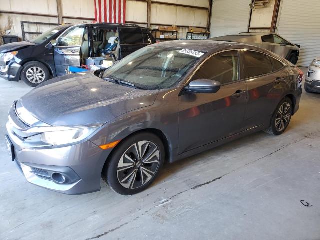 HONDA CIVIC EX 2016 with VIN 2HGFC1F33GH659044 - Photo from auction